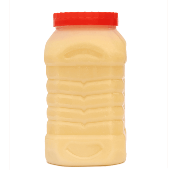 simpleorganicfood: A plastic jar with a red lid containing desi ghee, a type of clarified butter from South Asia. The jar is sitting on a gray background.
