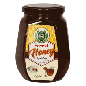 Jar of forest honey with the label "Food, Forest Honey عسل الغابة, الوان الصابل ۵۰۰ غرام".